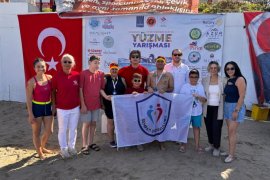 Milaslı Otizmli Gençlerden Kuşadası Açık Su Yüzme Yarışında Büyük Başarı